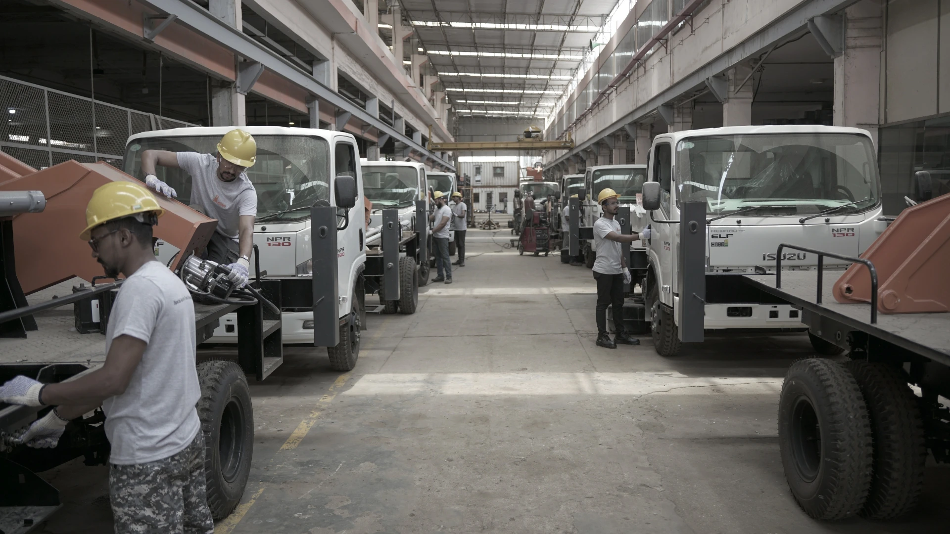 Meraj technicians assembling specialized vehicles during refurbishment services
